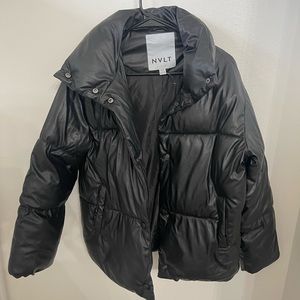 Brand new without tags black puffer coat. Never been worn. Size xs. Brand NVLT